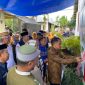 Bupati Gorontalo, Prof. Nelson Pomalingo, saat meresmikan rumah layak huni di Desa Pilohayanga, Kecamatan Telaga